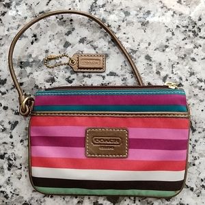 COACH striped wristlet metallic accents